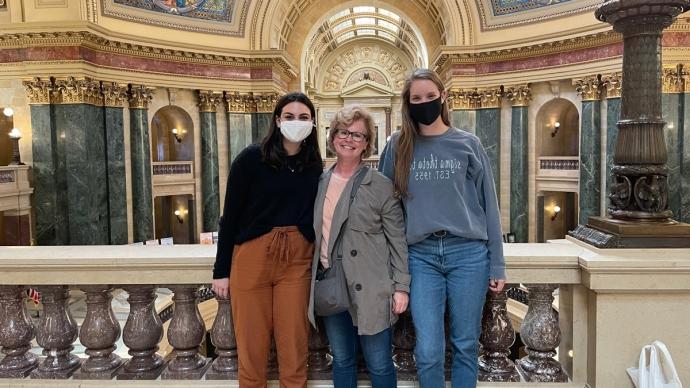 Jane Childers and students at research conference