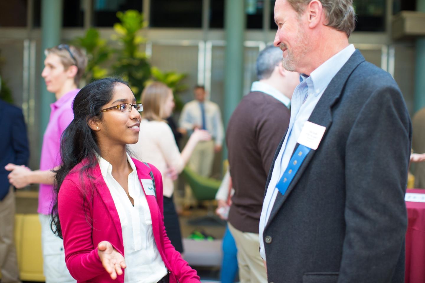 Image of student networking with alumni